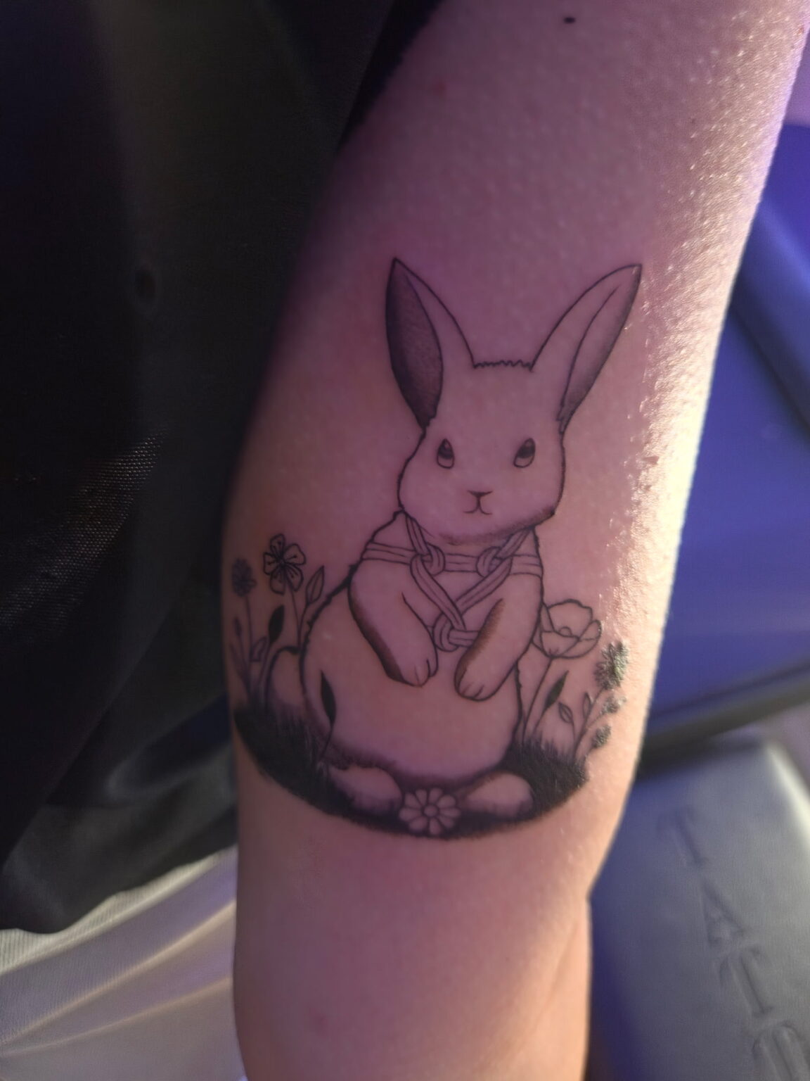 Real black and grey rabbit botanical tattoo by Chicago artist Elisha Marie