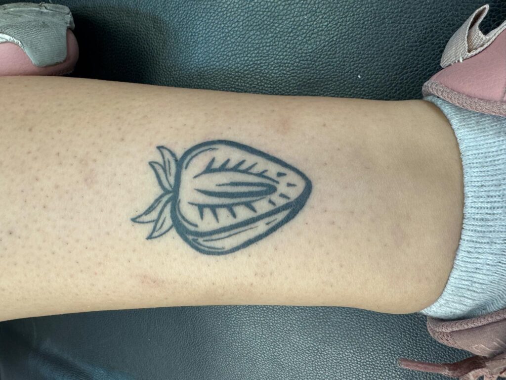 Small fruit tattoo by Elisha Marie